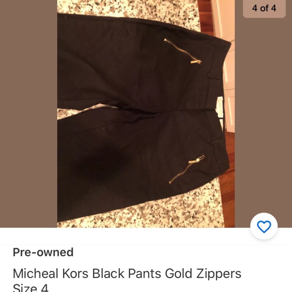 Micheal Kors gold zipper black pants. Size 4